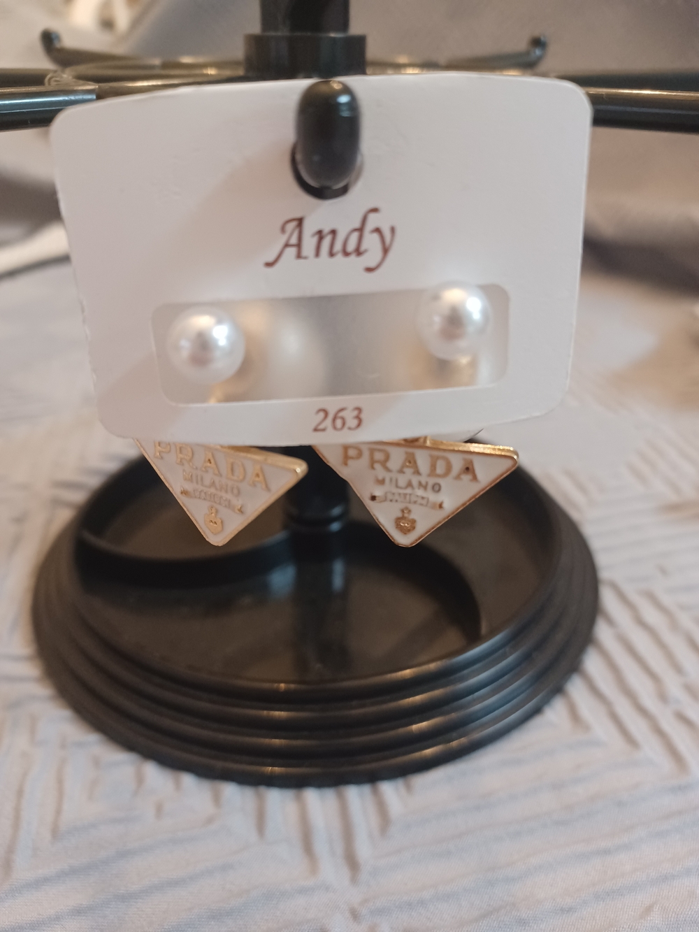 Gold Triangle Logo and White Pearl Stud Earrings